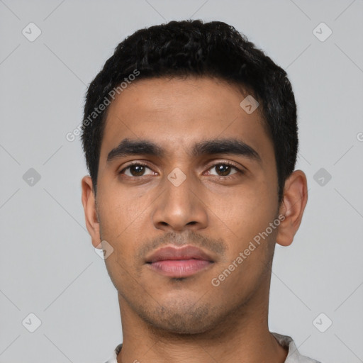 Neutral latino young-adult male with short  black hair and brown eyes