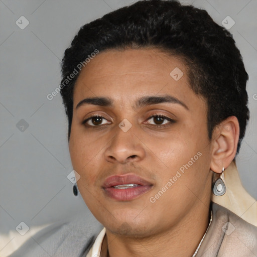 Joyful black young-adult female with short  black hair and brown eyes
