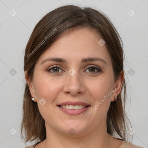 Joyful white young-adult female with medium  brown hair and grey eyes