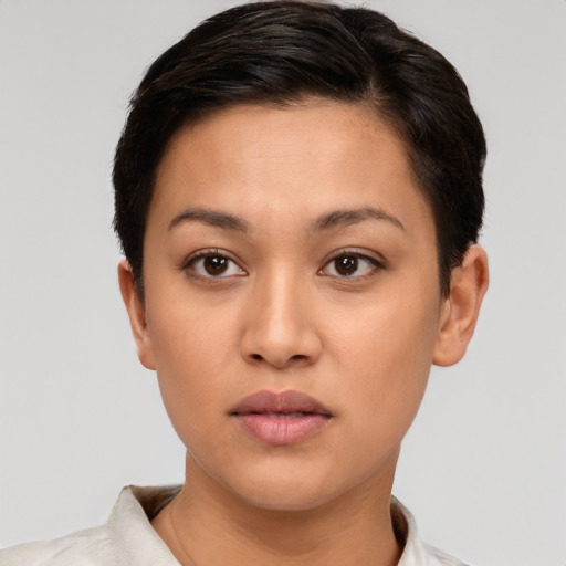 Neutral white young-adult female with short  brown hair and brown eyes