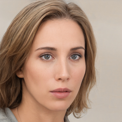 Neutral white young-adult female with medium  brown hair and grey eyes