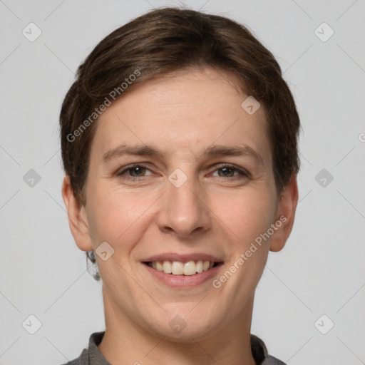 Joyful white young-adult female with short  brown hair and grey eyes