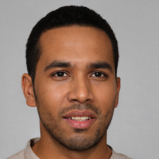 Neutral latino young-adult male with short  brown hair and brown eyes