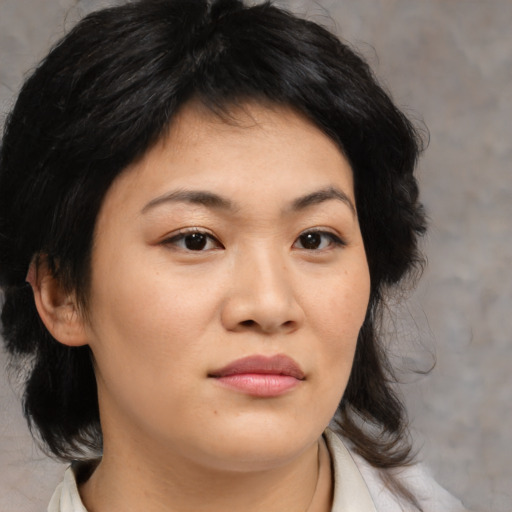 Neutral asian young-adult female with medium  brown hair and brown eyes