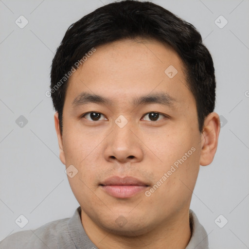 Neutral asian young-adult male with short  black hair and brown eyes