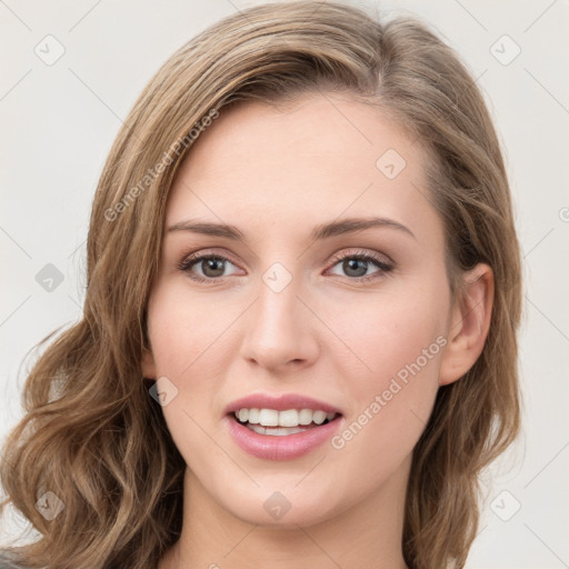 Joyful white young-adult female with medium  brown hair and green eyes