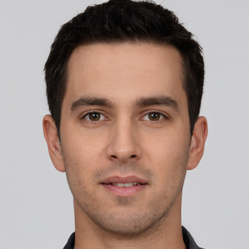 Neutral white young-adult male with short  brown hair and brown eyes