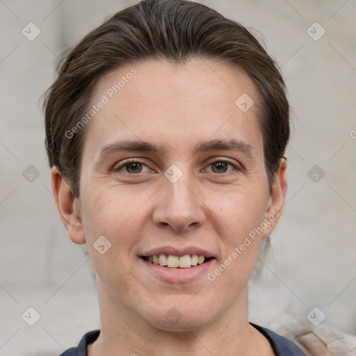 Joyful white adult male with short  brown hair and grey eyes