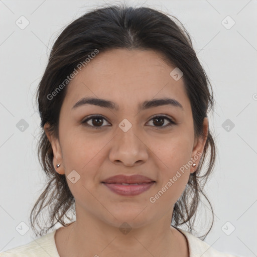 Joyful latino young-adult female with medium  brown hair and brown eyes