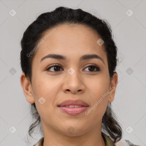 Joyful latino young-adult female with medium  brown hair and brown eyes