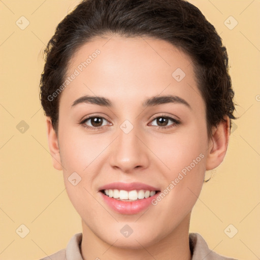 Joyful white young-adult female with short  brown hair and brown eyes