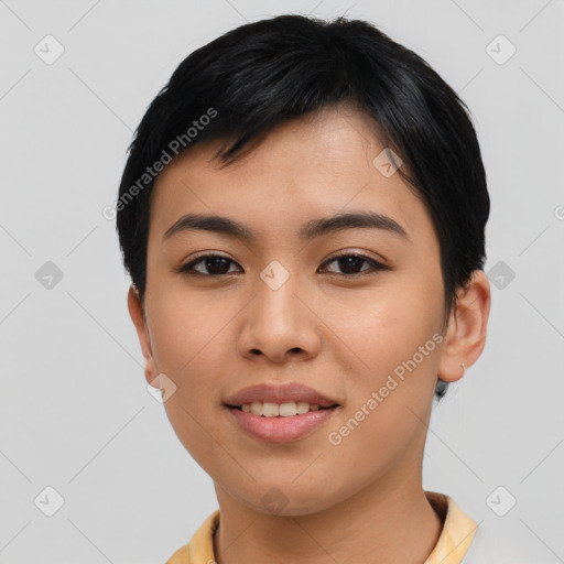 Joyful asian young-adult female with short  black hair and brown eyes