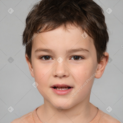 Joyful white child male with short  brown hair and brown eyes