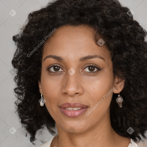 Joyful black young-adult female with medium  brown hair and brown eyes