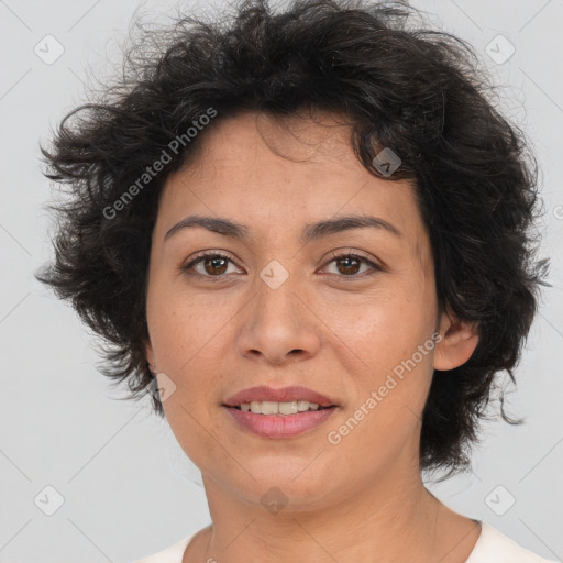 Joyful white adult female with short  brown hair and brown eyes