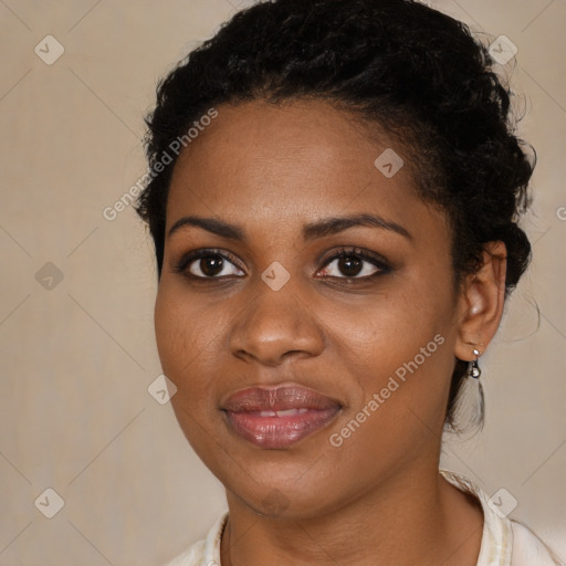 Joyful black young-adult female with medium  black hair and brown eyes