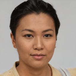 Neutral asian young-adult female with short  brown hair and brown eyes