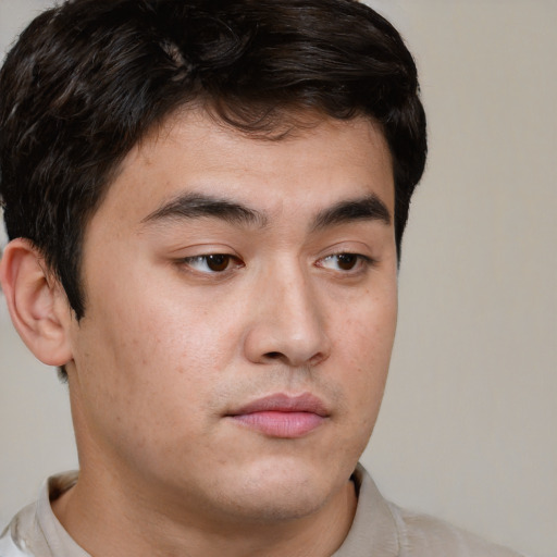 Neutral asian young-adult male with short  brown hair and brown eyes