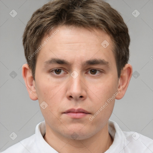 Neutral white young-adult male with short  brown hair and brown eyes