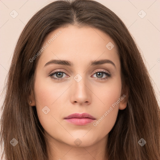 Neutral white young-adult female with long  brown hair and brown eyes