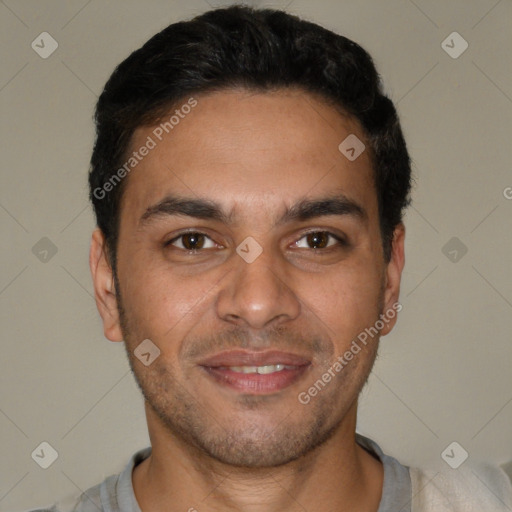 Joyful white young-adult male with short  black hair and brown eyes
