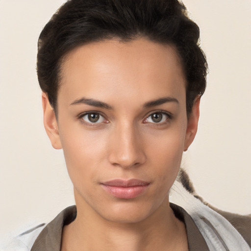 Neutral white young-adult female with short  brown hair and brown eyes