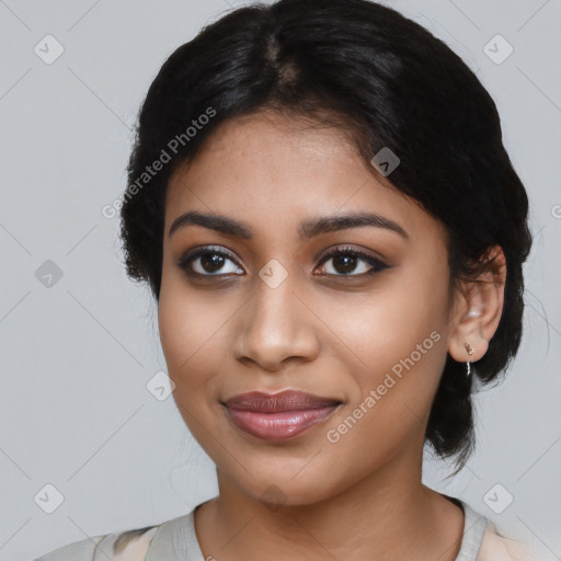 Joyful latino young-adult female with medium  black hair and brown eyes