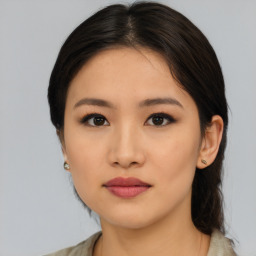 Neutral asian young-adult female with medium  brown hair and brown eyes