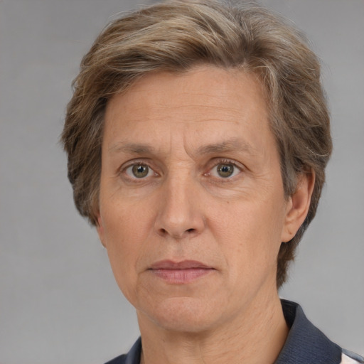 Neutral white middle-aged female with short  brown hair and brown eyes