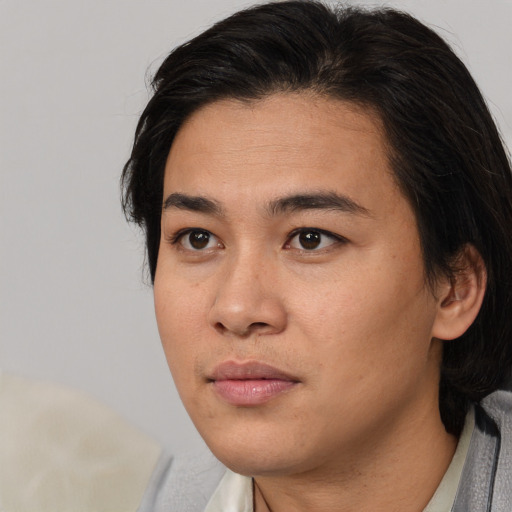 Neutral asian young-adult female with medium  black hair and brown eyes