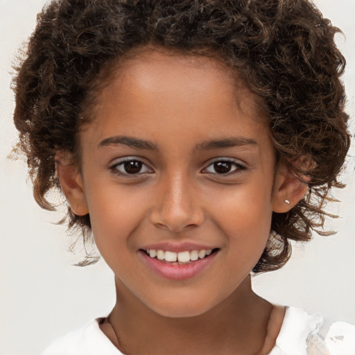 Joyful white child female with medium  brown hair and brown eyes