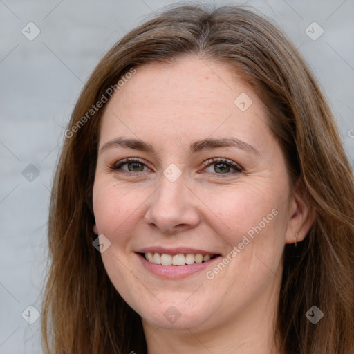 Joyful white young-adult female with long  brown hair and grey eyes