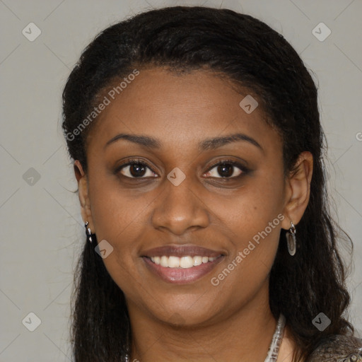 Joyful black young-adult female with medium  brown hair and brown eyes