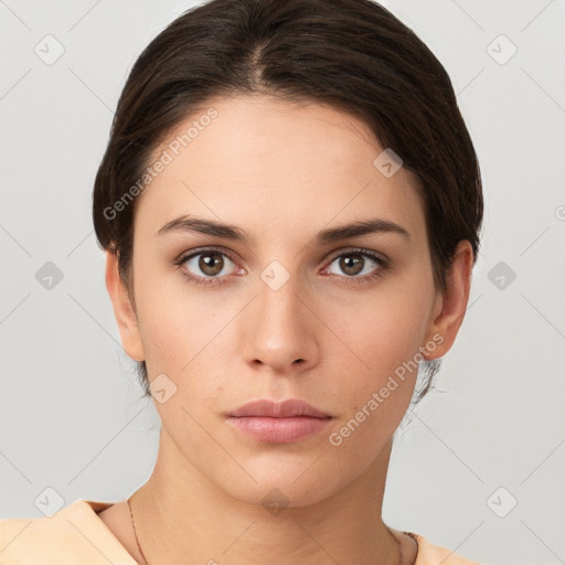 Neutral white young-adult female with short  brown hair and brown eyes