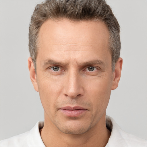 Neutral white adult male with short  brown hair and brown eyes