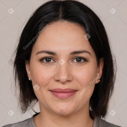 Joyful white adult female with medium  brown hair and brown eyes