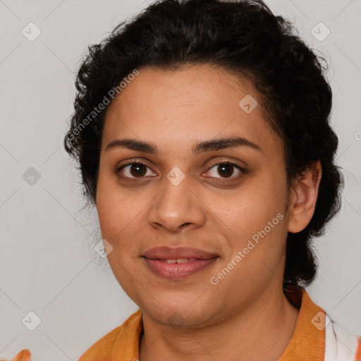 Joyful latino young-adult female with short  brown hair and brown eyes