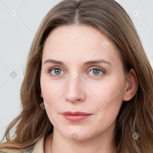 Neutral white young-adult female with long  brown hair and blue eyes