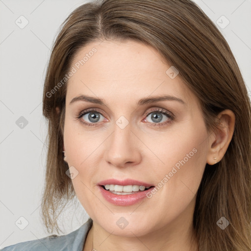 Joyful white young-adult female with long  brown hair and grey eyes