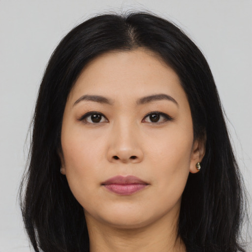 Neutral asian young-adult female with long  black hair and brown eyes