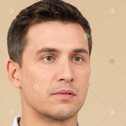 Neutral white young-adult male with short  brown hair and brown eyes