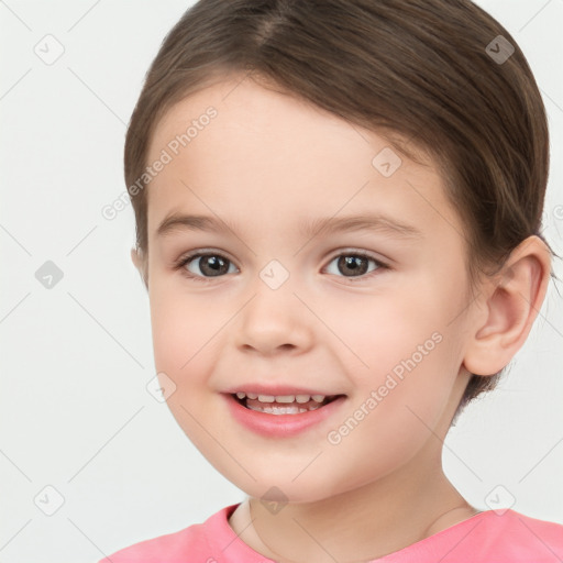 Joyful white child female with short  brown hair and brown eyes