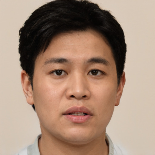 Neutral asian young-adult male with short  black hair and brown eyes