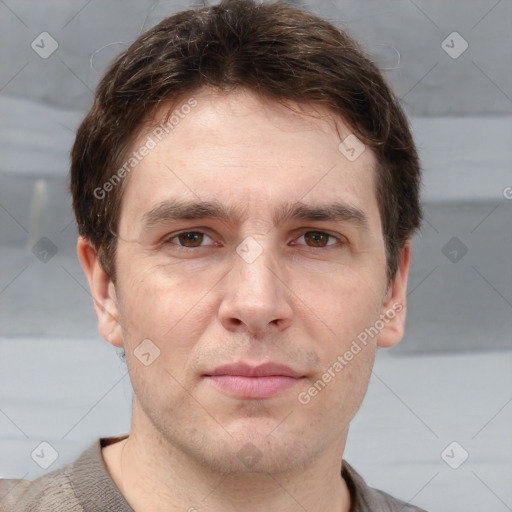 Joyful white adult male with short  brown hair and grey eyes