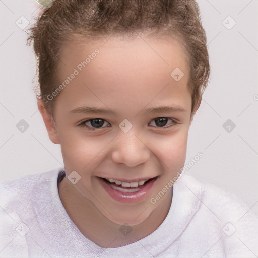 Joyful white child female with short  brown hair and brown eyes