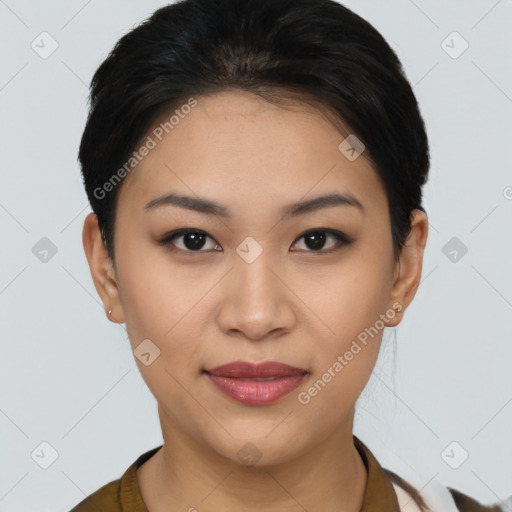 Joyful asian young-adult female with short  brown hair and brown eyes