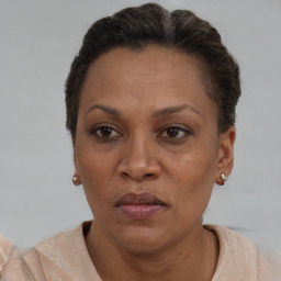 Neutral black adult female with short  brown hair and brown eyes