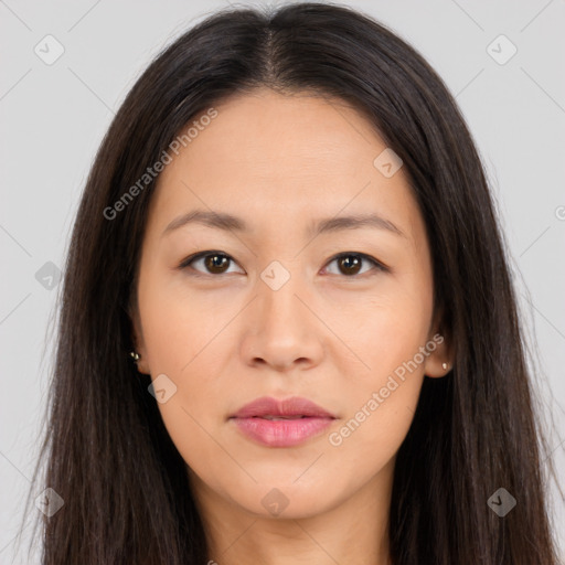 Joyful asian young-adult female with long  brown hair and brown eyes