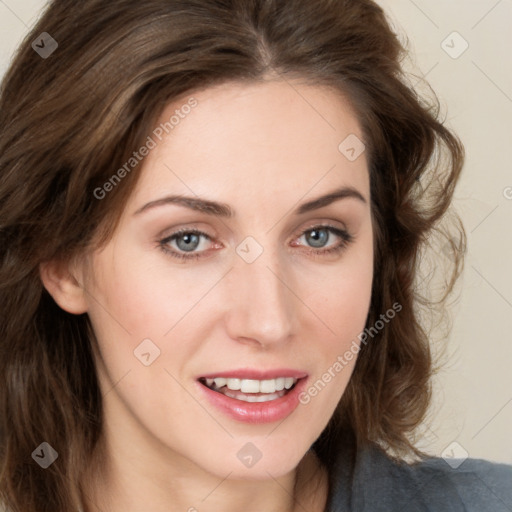 Joyful white young-adult female with long  brown hair and green eyes