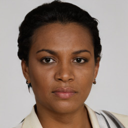 Neutral latino young-adult female with short  brown hair and brown eyes